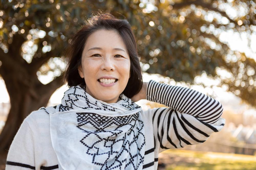 tooth extraction royal palm beach | woman smiling