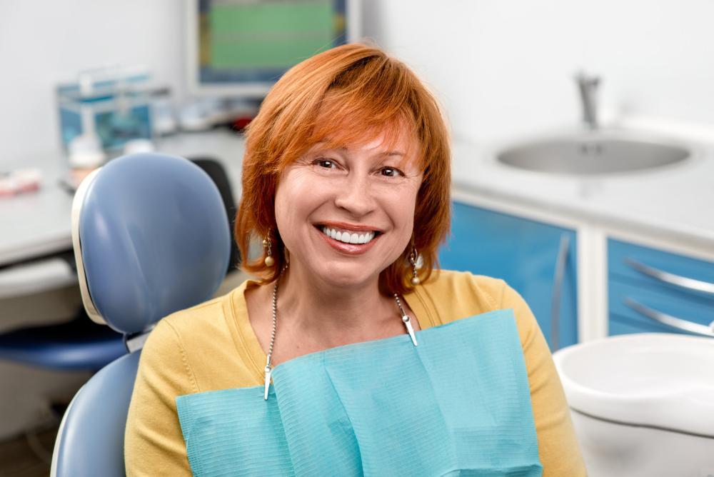 dental exams royal palm beach | woman in dental chair