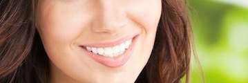 Woman with tooth restoration in Royal Palm Beach, FL