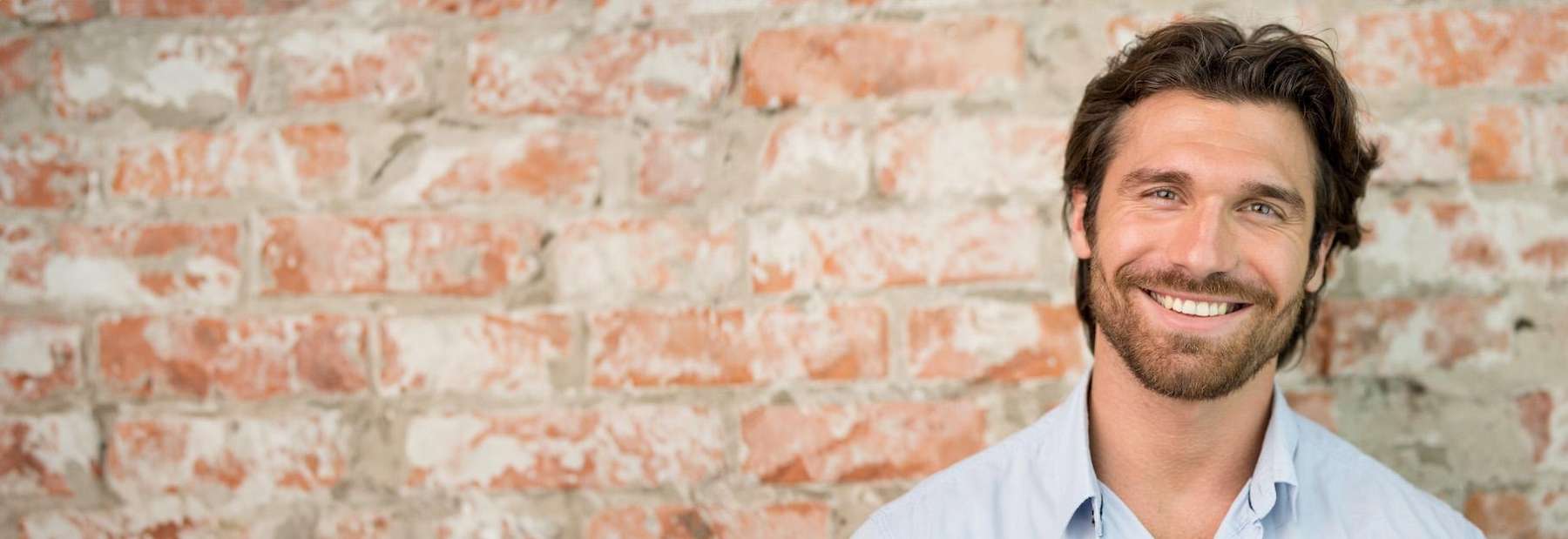 tooth extractions royal palm beach | man smiling