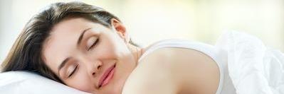 woman sleeping peacefully after sleep apnea treatment