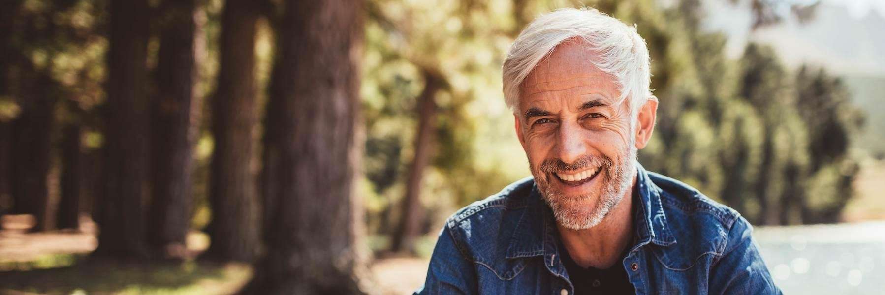 man smiling after getting dentures in Royal Palm Beach