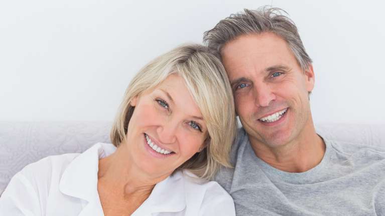 couple with snap on dentures in royal palm beach