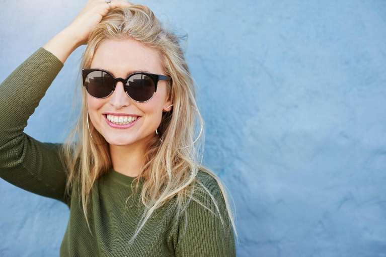 woman with healthy gums after deep cleaning in Royal Palm Beach