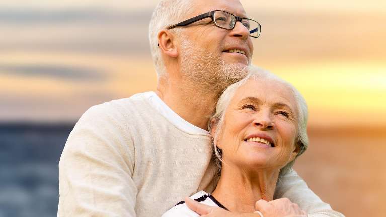 couple with snap on dentures in royal palm beach